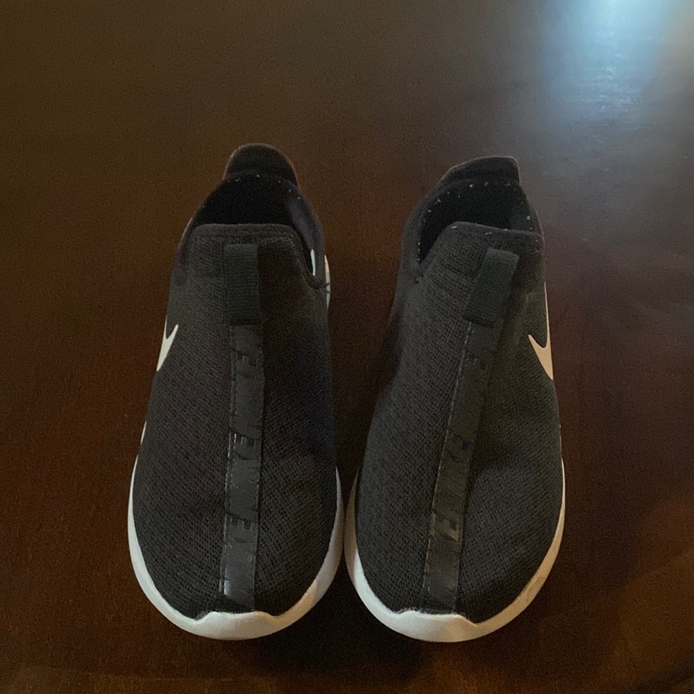 Nike women gym shoes size 7.5 US ,black in color